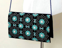 Load image into Gallery viewer, Navy blue velvet clutch bag embroidered with silver and teal art deco inspired design and embellished with semi precious stones, zardozi evening bag, cord strap.

