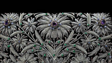Load image into Gallery viewer, Luxury hand embroidered black velvet evening bag clutch in floral pattern with amethyst gemstones, close up view. 
