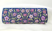 Load image into Gallery viewer, Blue Silk clutch bag embroidered with pink flowers and embellished with emerald and star rubies, zardozi purse, rear view. 
