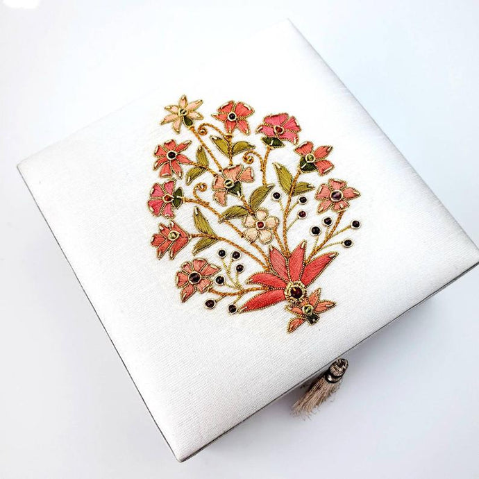 White silk wedding keepsake box embroidered with orange floral pattern, and ruby stone, zardozi box.