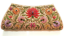 Load image into Gallery viewer, Peach silk clutch hand embroidered with multicolor silk flowers and red lotus flower and embellished with star rubies, zardozi evening bag.
