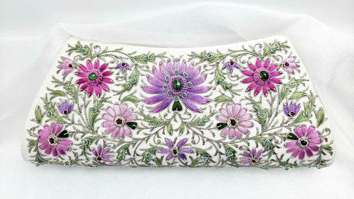 Ivory silk clutch hand embroidered with purple pink flowers and embellished with emeralds and rubies, zardozi evening bag.