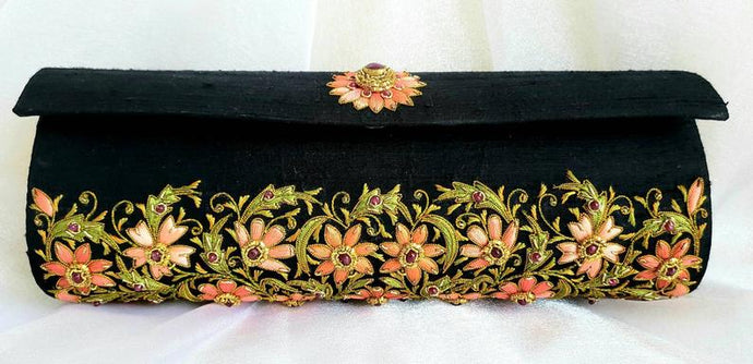 Luxury black silk clutch bag embroidered with orange flowers all over and embellished with ruby cabochons, zardozi purse.