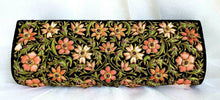 Load image into Gallery viewer, Designer black silk clutch bag embroidered with orange flowers all over and embellished with rubies, zardozi purse, back view. 
