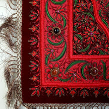 Load image into Gallery viewer, Hand embroidered Jewel carpet wall hanging, red flowers embroidered on burgundy red velvet, inlaid with agate stones, zardozi tapestry, close up view. 
