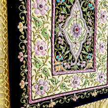 Load image into Gallery viewer, Embroidered lavender purple jewel carpet wall hanging in floral pattern, embroidered purple and pink flowers on black velvet tapestry, zardozi tapestry, side view.
