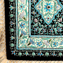 Load image into Gallery viewer, Embroidered blue floral tapestry, Turquoise blue silk flowers embroidered on black velvet, zardozi jewel carpet tapestry, close up of border.
